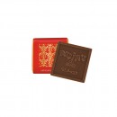 Carrés de chocolat au lait pur beurre de cacao avec éclats de praliné croustillant